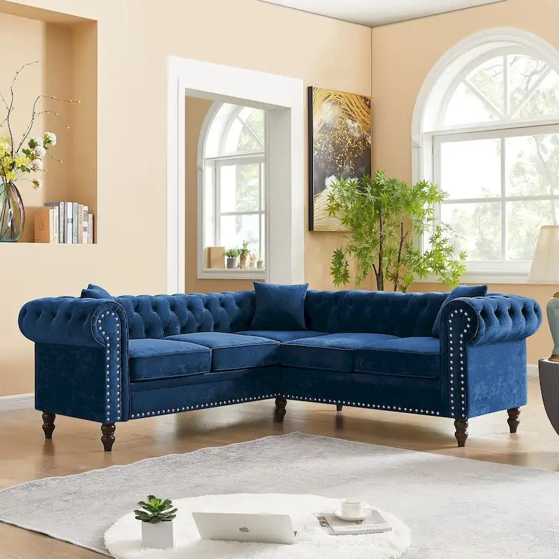 Chesterfield Ecksofa mit tiefer Knopfheftung, gerollten Armlehnen und L-Form