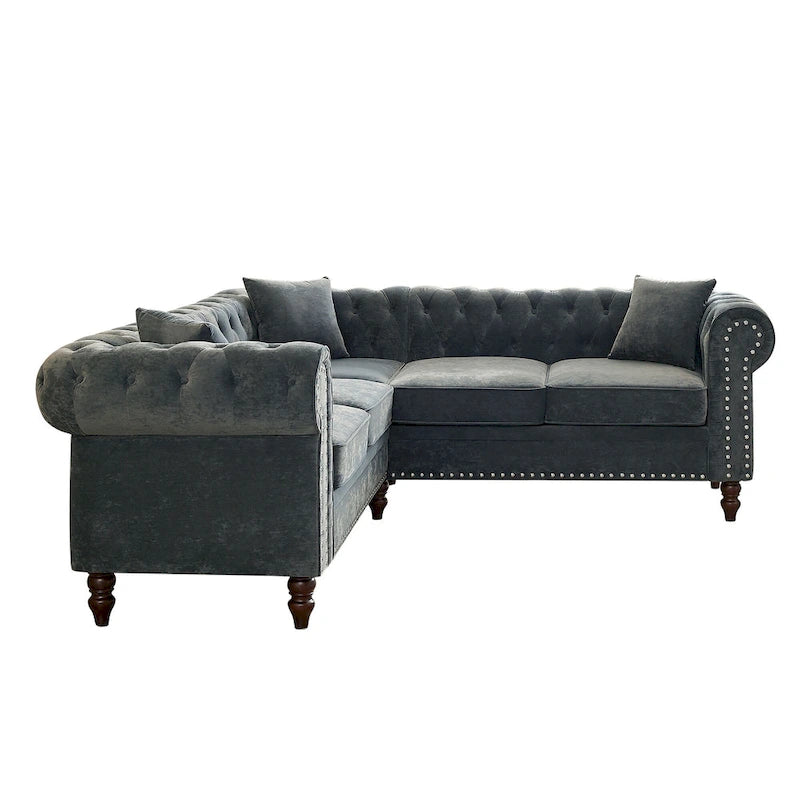 Chesterfield Ecksofa mit tiefer Knopfheftung, gerollten Armlehnen und L-Form