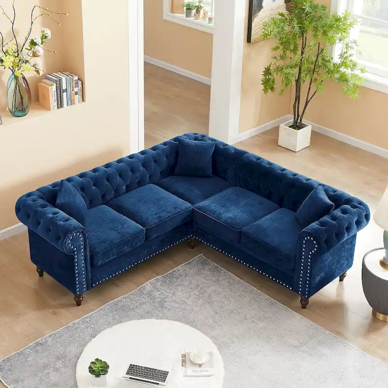 Chesterfield Ecksofa mit tiefer Knopfheftung, gerollten Armlehnen und L-Form