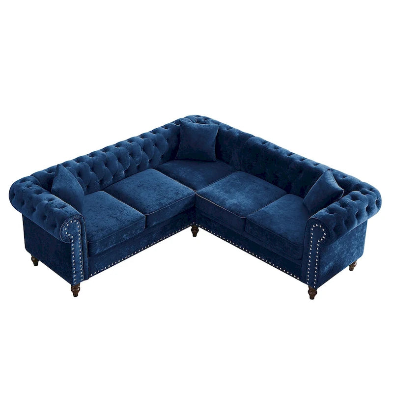 Chesterfield Ecksofa mit tiefer Knopfheftung, gerollten Armlehnen und L-Form