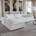 L-förmiges Sofa mit Leinenbezug, mehreren Kissen und Chaiselongue