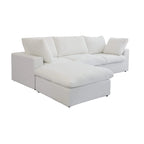 L-förmiges Sofa mit Leinenbezug, mehreren Kissen und Chaiselongue