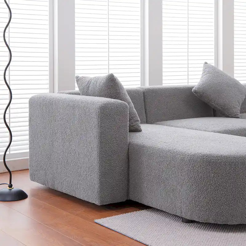 Modernes L-förmiges Bouclé-Sofa mit geschwungener Sitzfläche (linke Ausrichtung)
