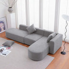 Modernes L-förmiges Bouclé-Sofa mit geschwungener Sitzfläche (rechtsseitig ausgerichtet)