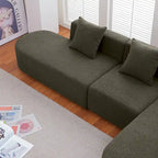 Modernes L-förmiges Bouclé-Sofa mit geschwungener Sitzfläche (rechtsseitig ausgerichtet)