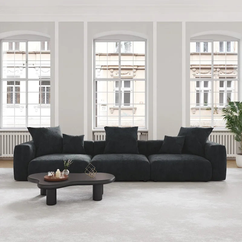 Schwarzes Cord-Ecksofa, individuell anpassbares Sofa mit Kissen.