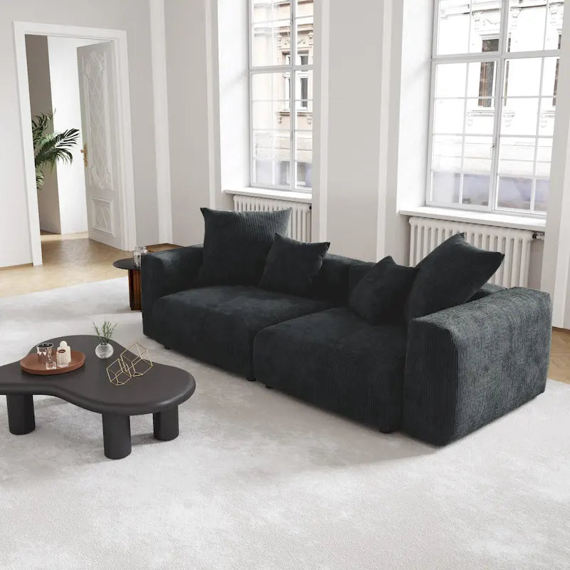 Schwarzes Cord-Ecksofa, individuell anpassbares Sofa mit Kissen.
