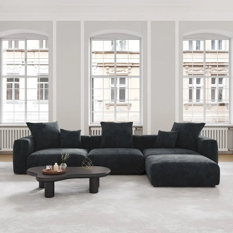 Schwarzes Cord-Ecksofa, individuell anpassbares Sofa mit Kissen.