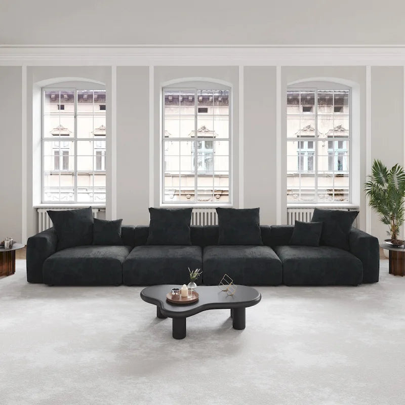Schwarzes Cord-Ecksofa, individuell anpassbares Sofa mit Kissen.