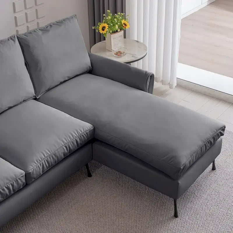 Modernes L-förmiges Sofa aus Kunstleder mit umkehrbarer Recamiere