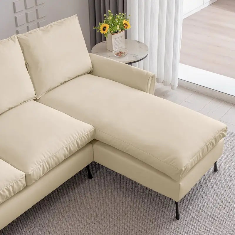 Modernes L-förmiges Sofa aus Kunstleder mit umkehrbarer Recamiere
